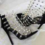 azmodo Rivet Clear Black Stiletto Heel Zipper Sandals