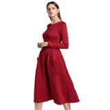 Autumn and winter long-sleeved solid color round neck zipper pocket dress