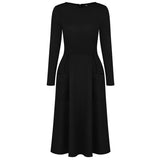 Autumn and winter long-sleeved solid color round neck zipper pocket dress