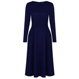 Autumn and winter long-sleeved solid color round neck zipper pocket dress